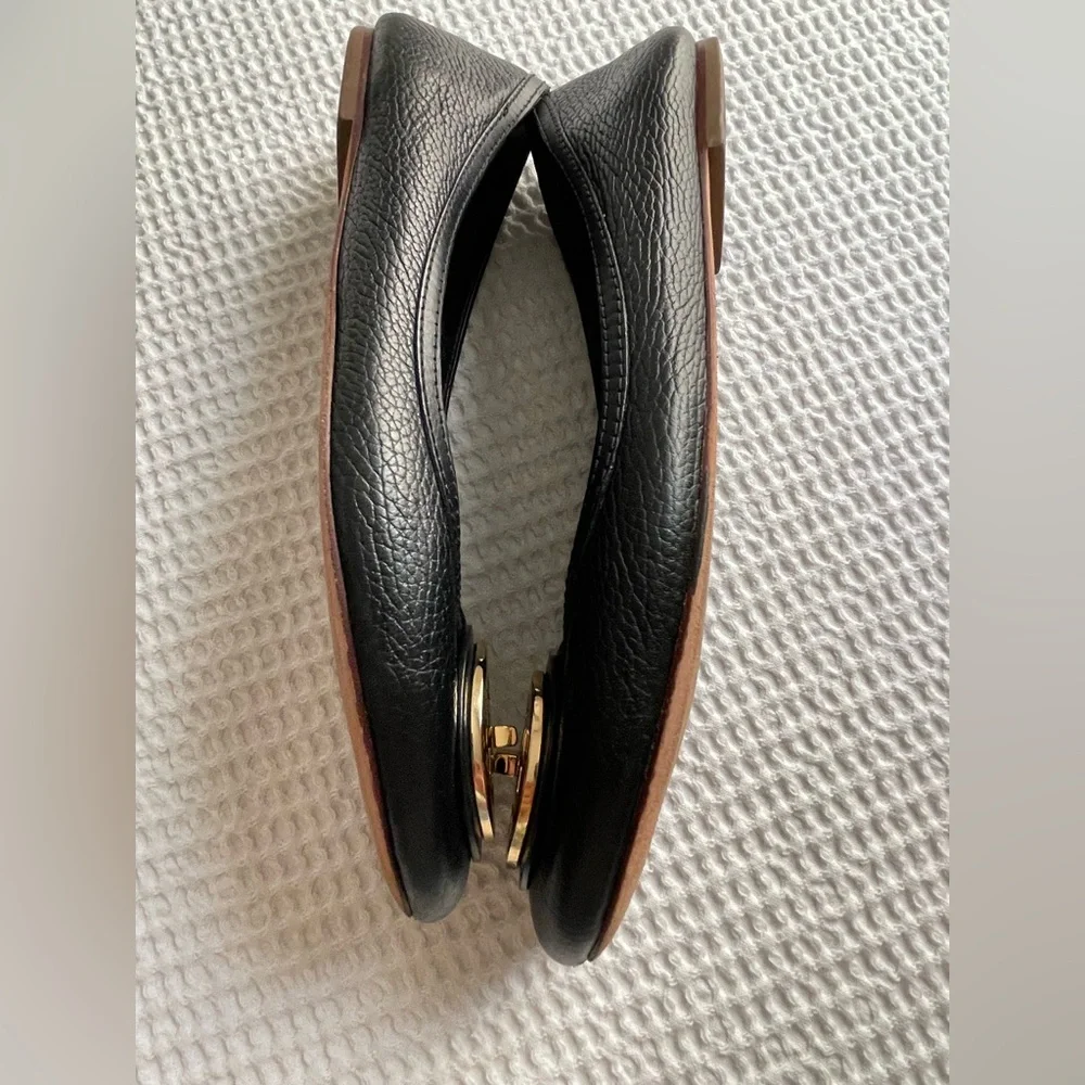 Tory Burch Black Flats with Gold Emblem